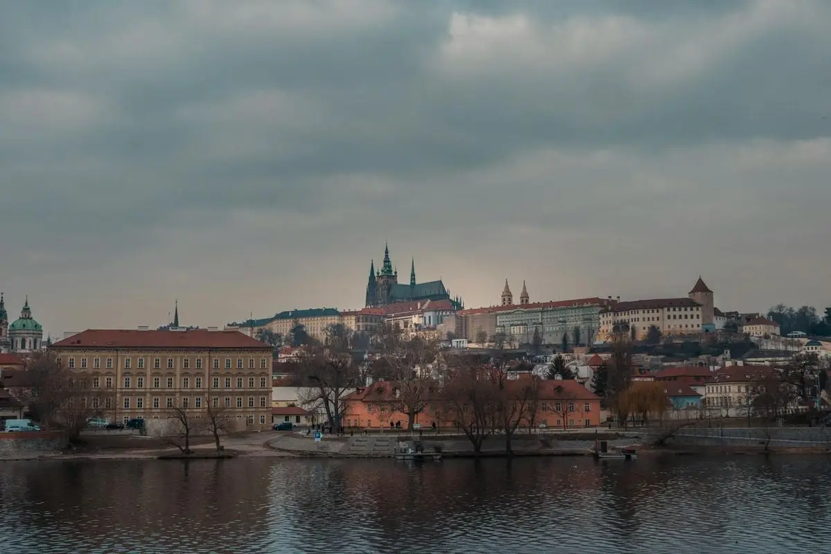 Gloomy Prague Castle and Vltava River view, perfect for travel photography.