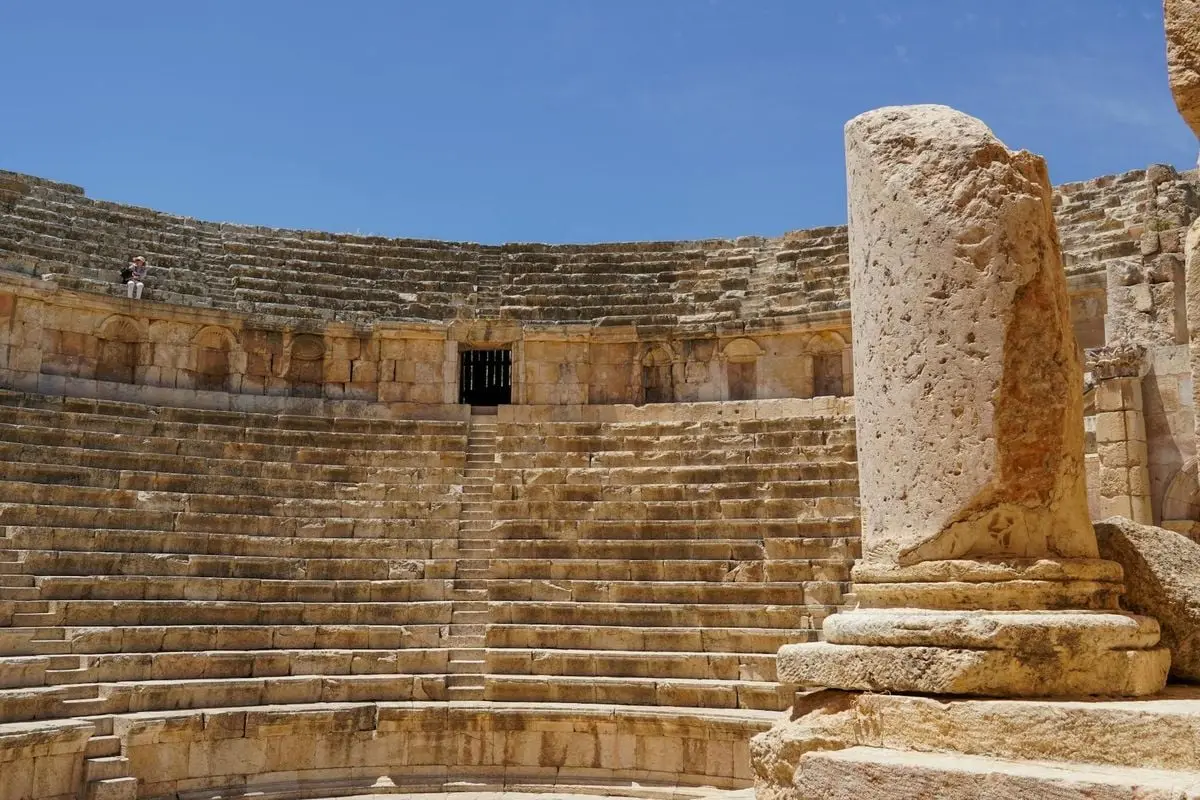 Explore the ancient Roman amphitheater in Jerash, a stunning archeological site in Jordan.