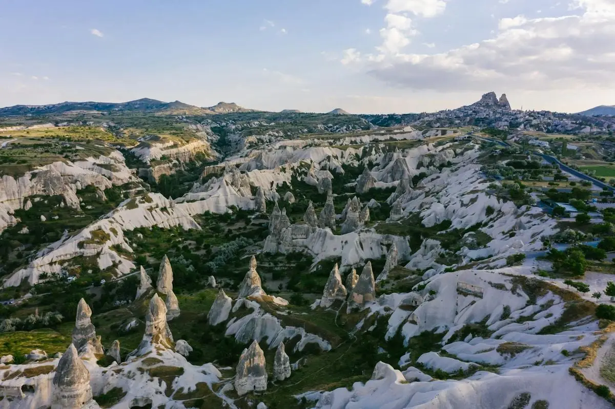 Explore Cappadocia's iconic rock formations and breathtaking natural scenery from above.