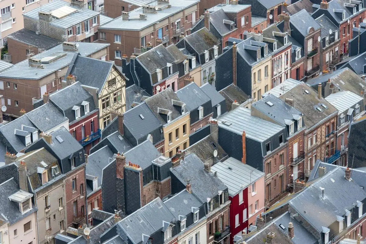 Charming aerial view of traditional architecture rooftops in Le Tréport, Normandy.