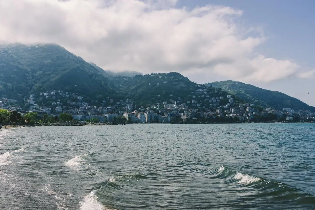 Beautiful coastal mountains in Ordu, Turkey with gentle waves and a lush environment.