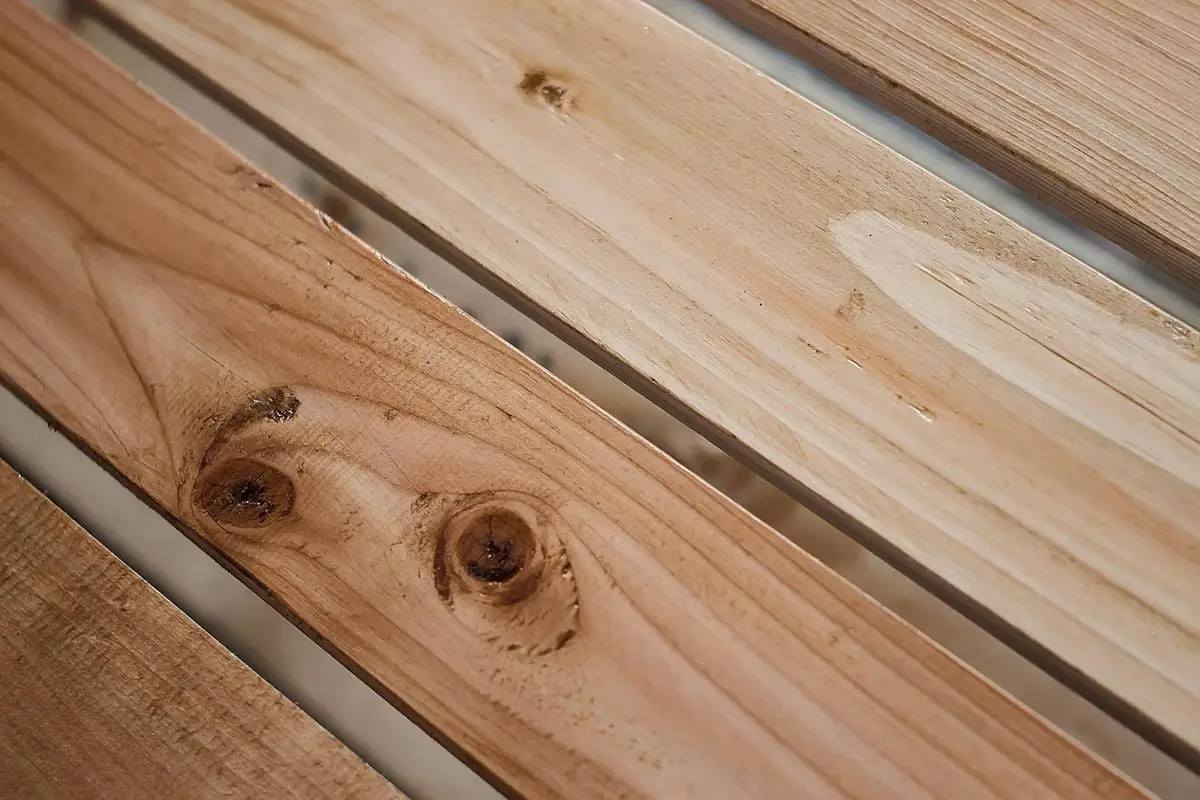Detailed close-up of natural wooden planks showing texture and grain.