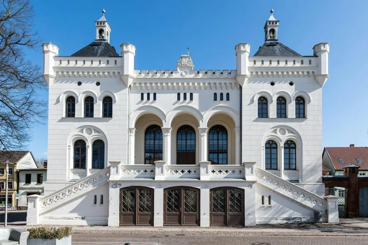 Front view of the historic Wittenburg Town Hall in Mecklenburg-Vorpommern, Germany, under blue skies.