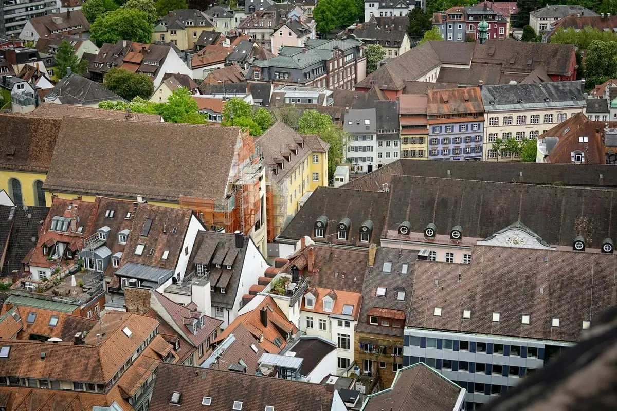 A picturesque aerial view capturing the unique Bavarian architecture and colorful rooftops of a charming town.