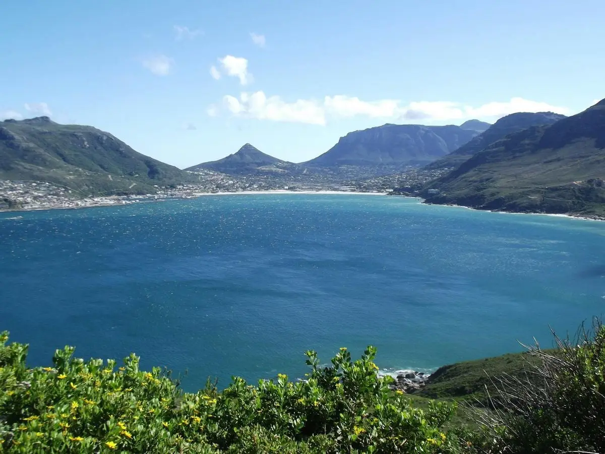Breathtaking view of Hout Bay in Cape Town with mountains and ocean.