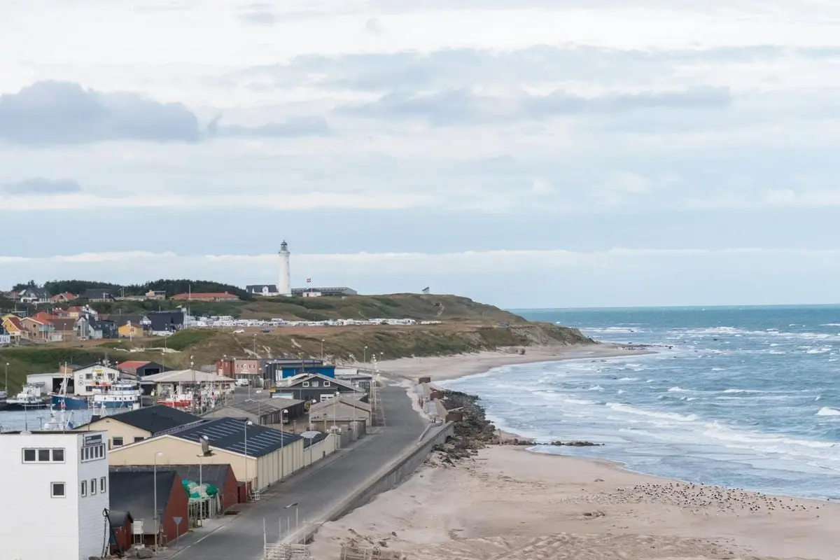 Discover the stunning coastal town of Hirtshals, Denmark, featuring the iconic lighthouse and sandy beaches.