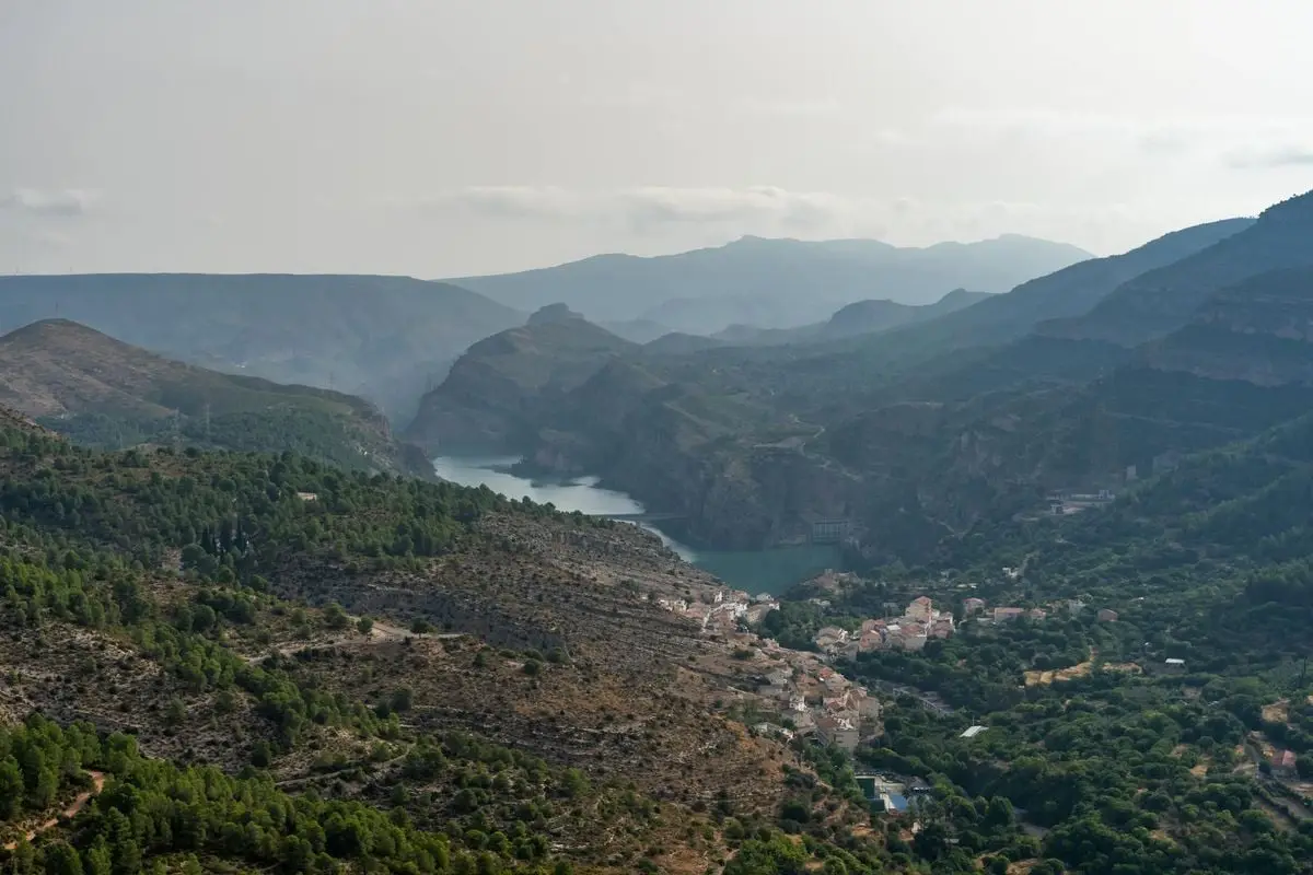 Breathtaking panoramic view of the valley and lake in Cortes de Pallás, Valencia, Spain.