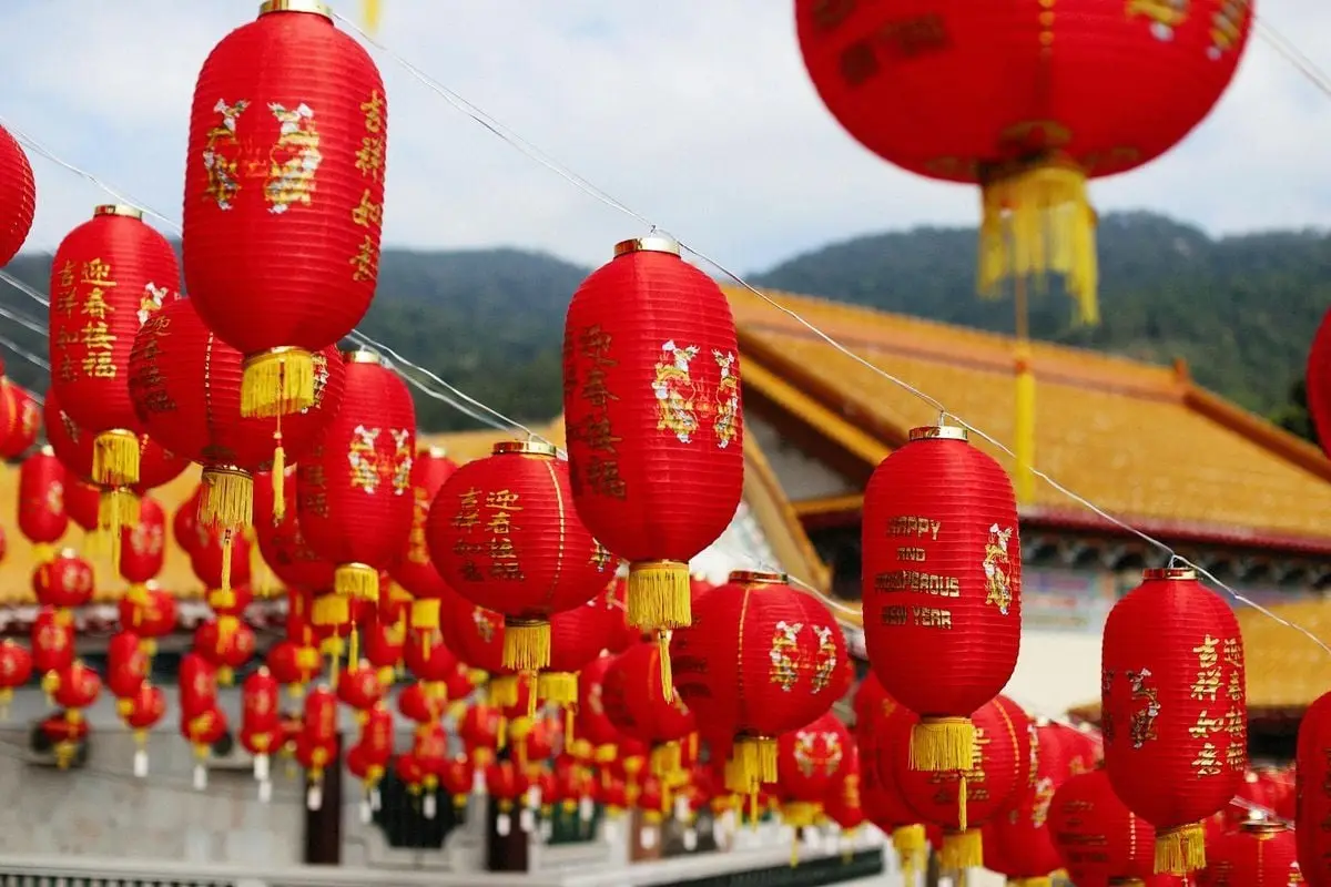 Vibrant red lanterns hanging outside, symbolizing the festive spirit of the Lunar New Year.