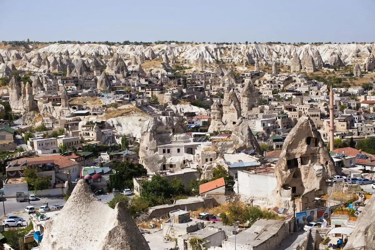 A breathtaking view over Göreme, featuring the iconic rock formations and cave dwellings unique to Cappadocia, Turkey.