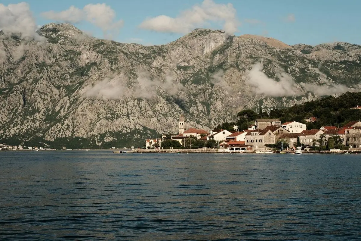 Picturesque view of Kotor Bay with surrounding mountains and historic town.