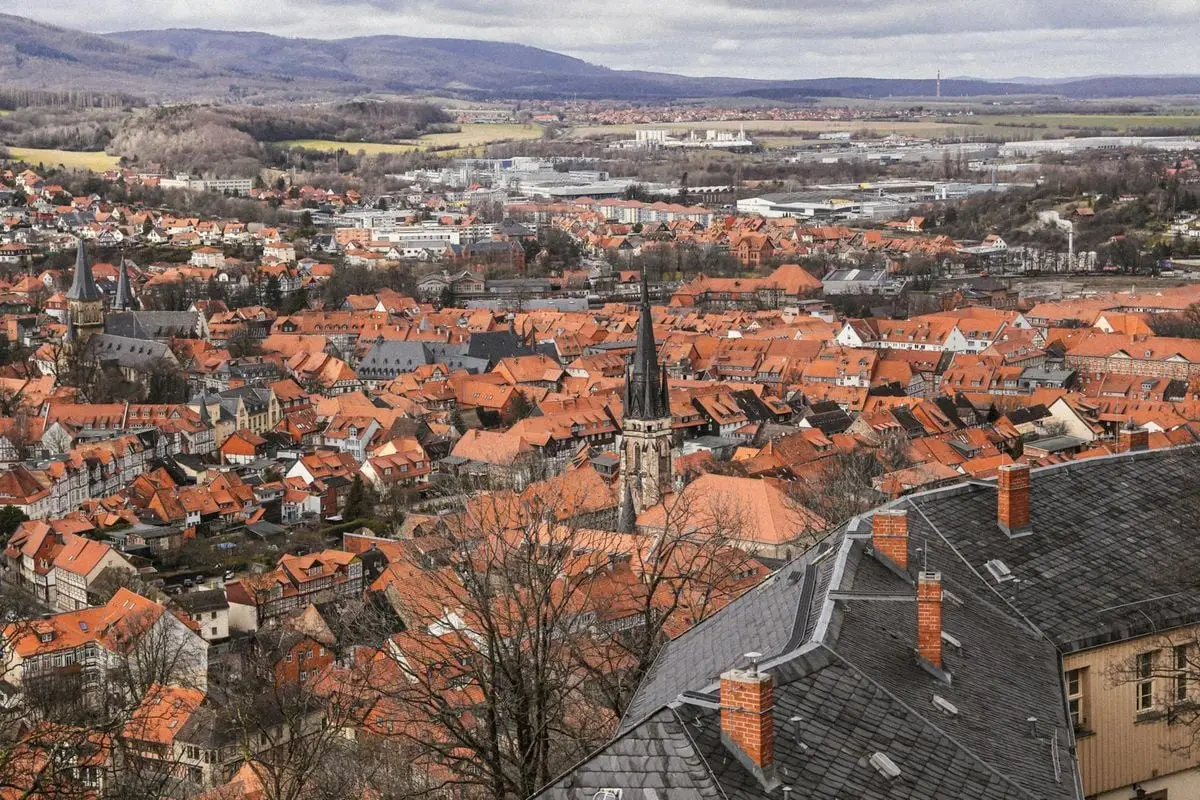 Aerial view of Wernigerode showcasing red-tiled roofs and historical architecture.