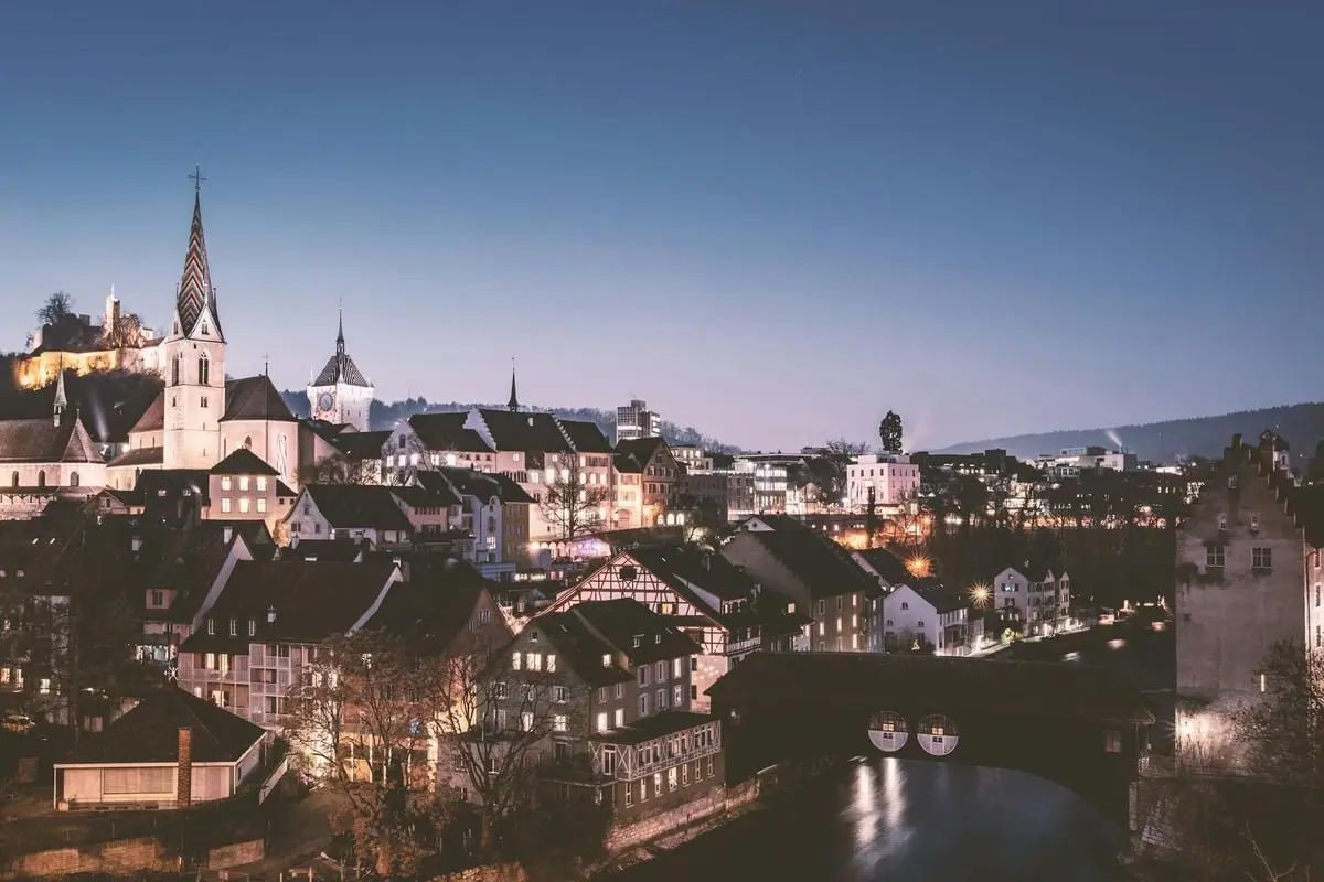 Beautiful twilight cityscape of Baden, Switzerland with historic architecture and skyline.