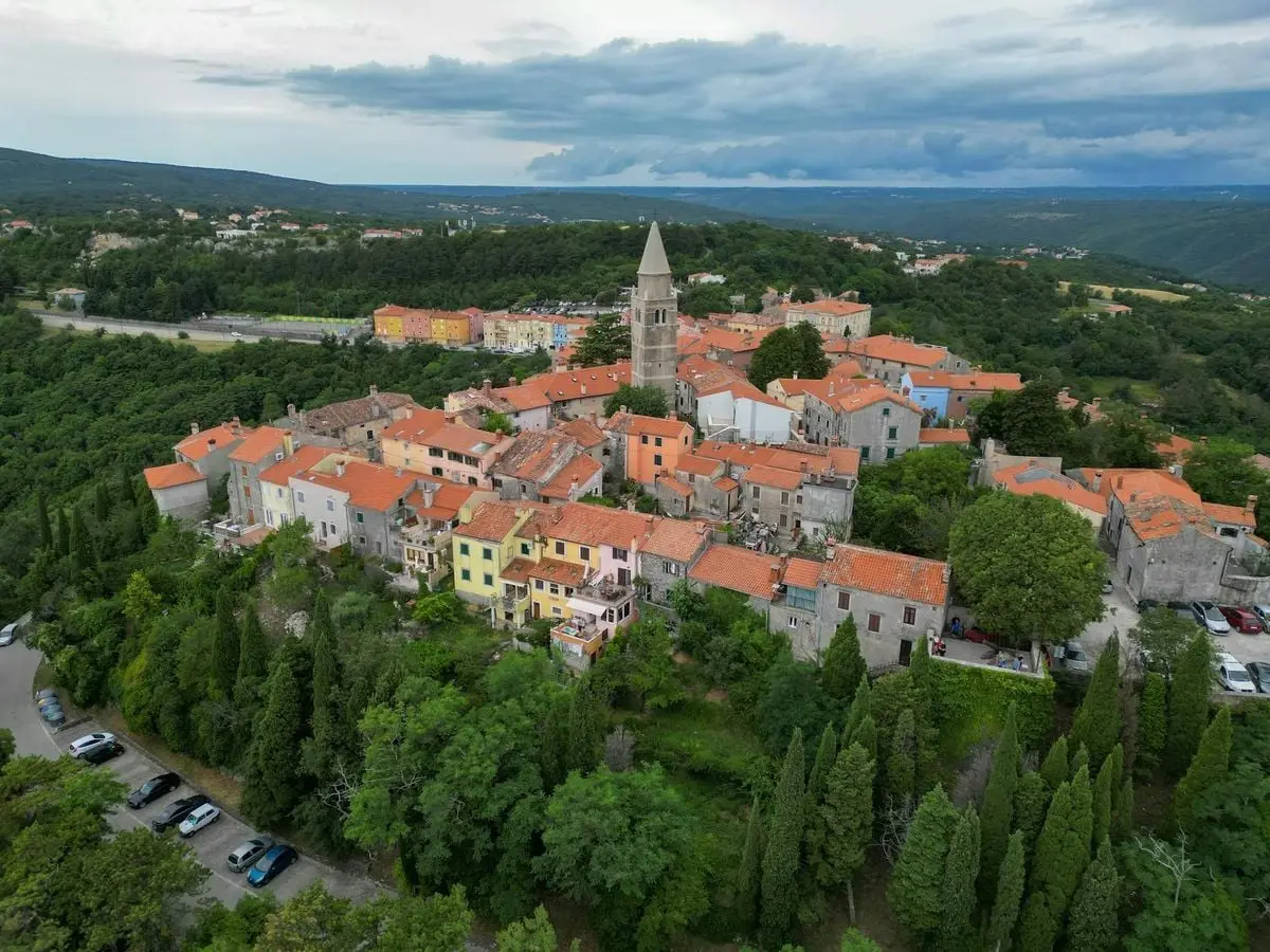 Discover the picturesque old town of Labin, Croatia, with its charming buildings and scenic landscape.