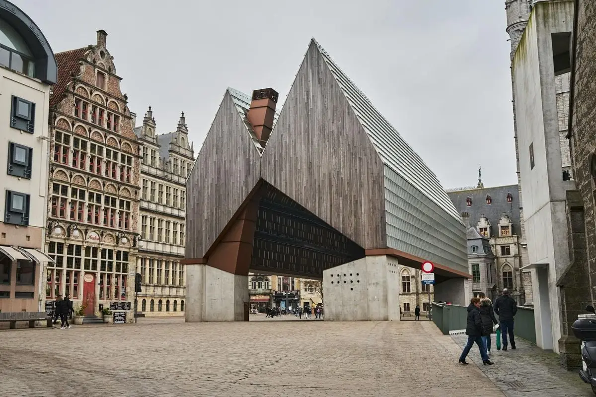 Contemporary pavilion in Ghent city plaza surrounded by historical buildings, without crowd.