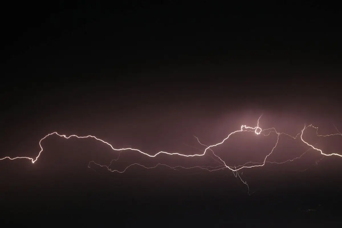 Captivating image of a lightning strike illuminating the dark night sky in Puerto Vallarta.