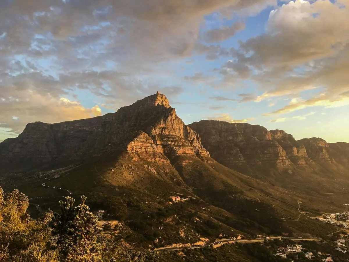 A breathtaking view of Table Mountain during sunset, showcasing Cape Town's natural beauty.