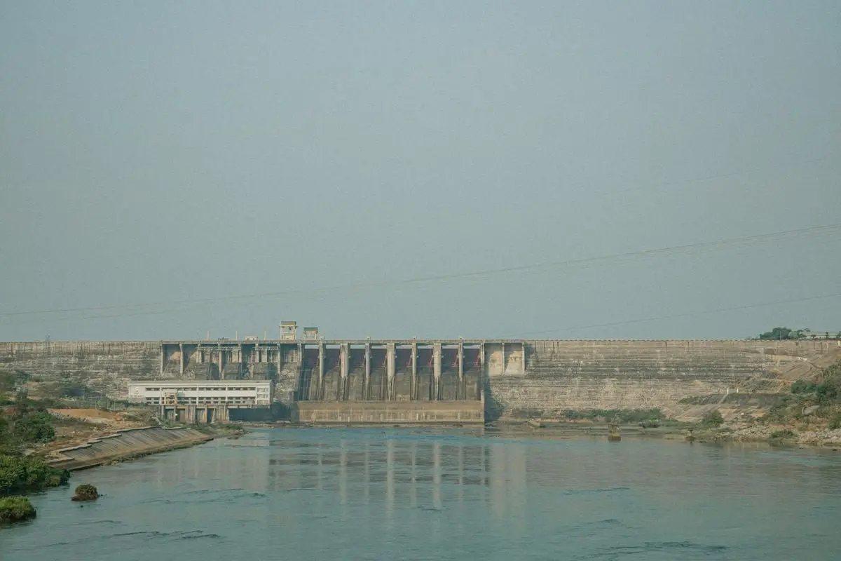 A serene view of a dam with a tranquil river in Gia Lai, Vietnam.