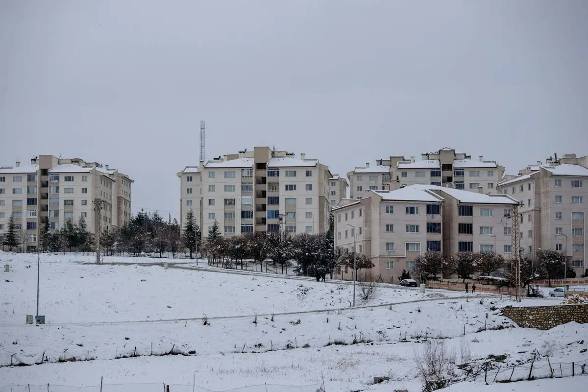 Scenic view of snow-covered apartments in Palu, Elazığ, Türkiye.