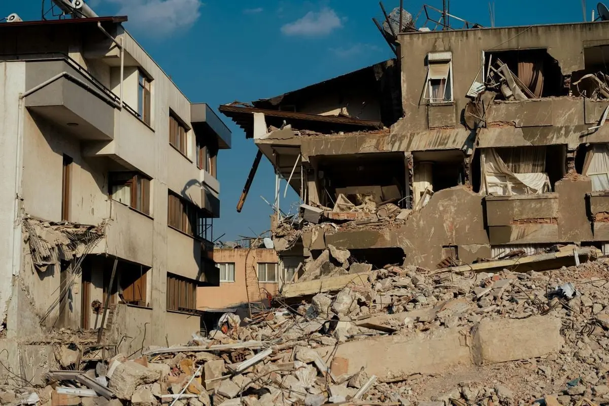 Damaged buildings from earthquake in Antakya, Turkey. Structural collapse and debris.