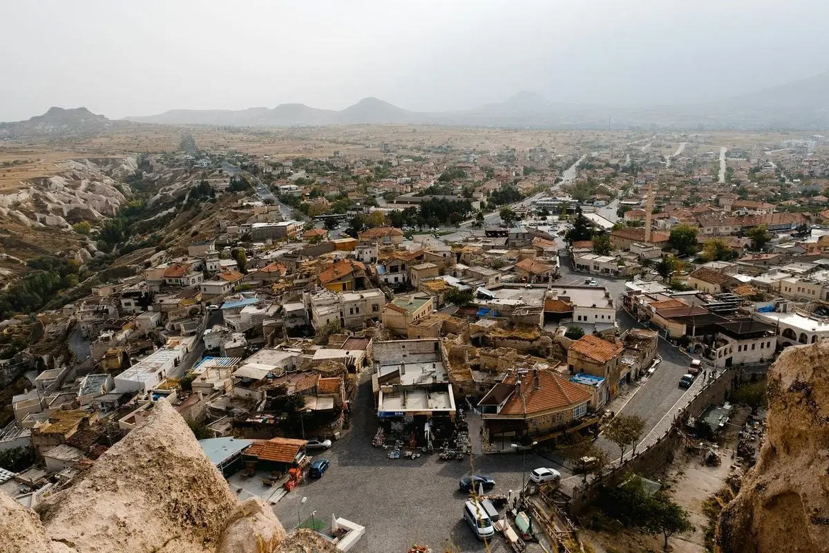 Explore the scenic cityscape of Nevşehir, Turkey with its unique architecture and breathtaking landscape.