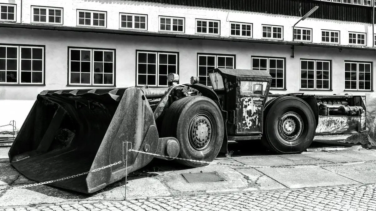 Black and white photo of historical mining machinery at Rammelsberg Museum in Goslar, Germany.
