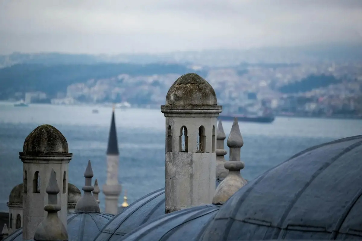 Historical domes with a sea backdrop, showcasing traditional architecture and serene views.