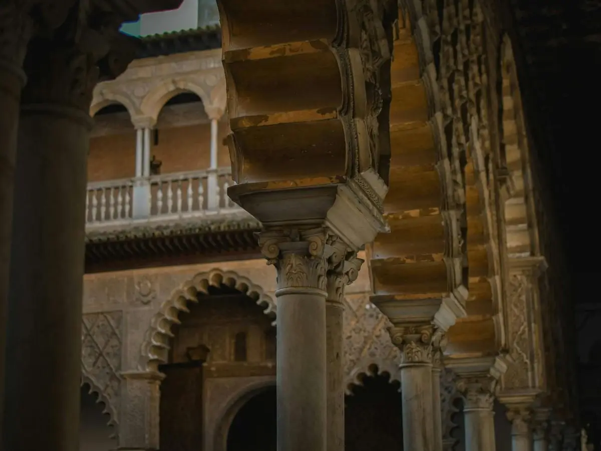 Beautifully detailed marble columns in a historic building, showcasing intricate architecture.