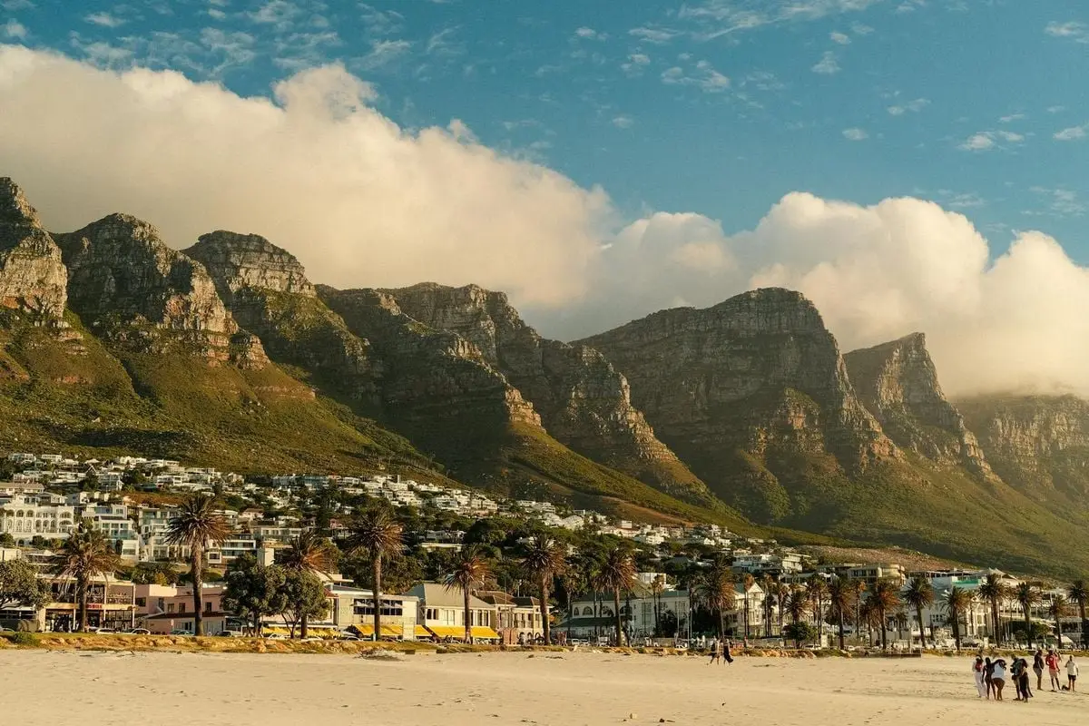 Majestic Twelve Apostles mountain range in Cape Town with a vibrant seaside view.
