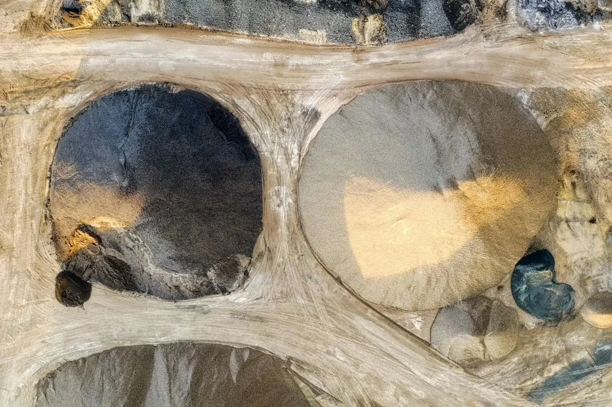 Aerial shot of rock formations and dirt roads in a quarry near Rochester, Minnesota.