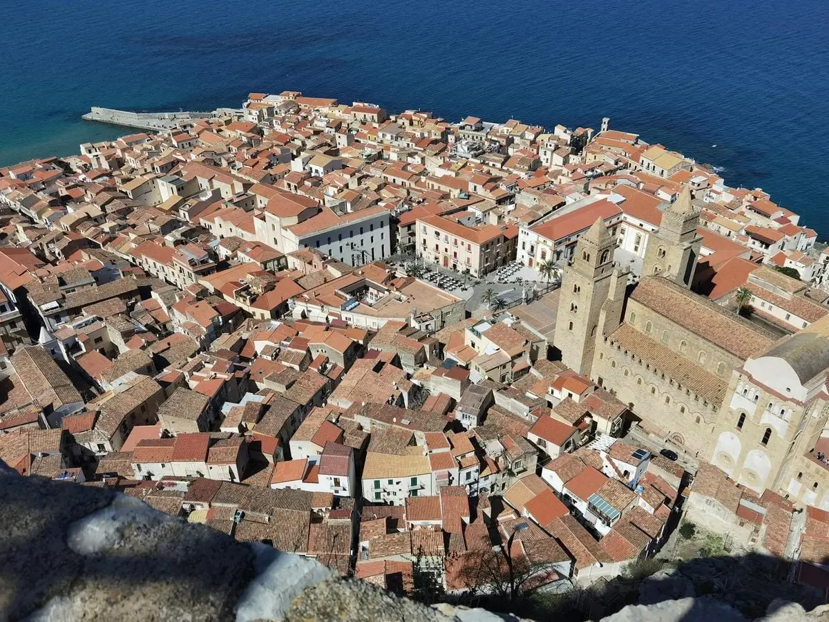 Stunning aerial view showcasing the historic architecture of Cefalù, a coastal town in Sicily, Italy.