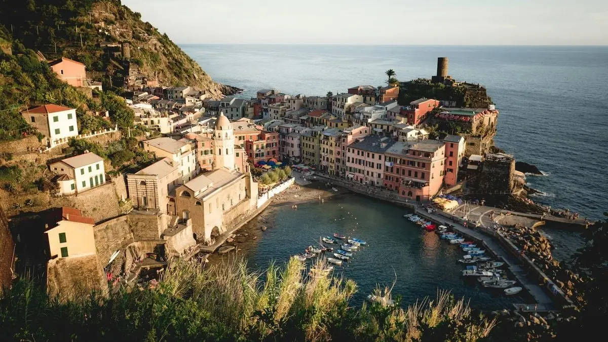A breathtaking aerial view of Vernazza, a colorful coastal village in Cinque Terre, Italy, by the sea.