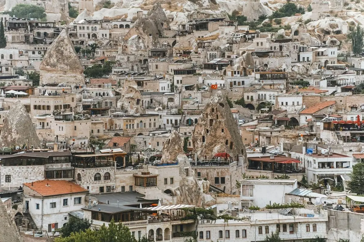 Explore the breathtaking rock formations and ancient dwellings of Cappadocia, Turkey.