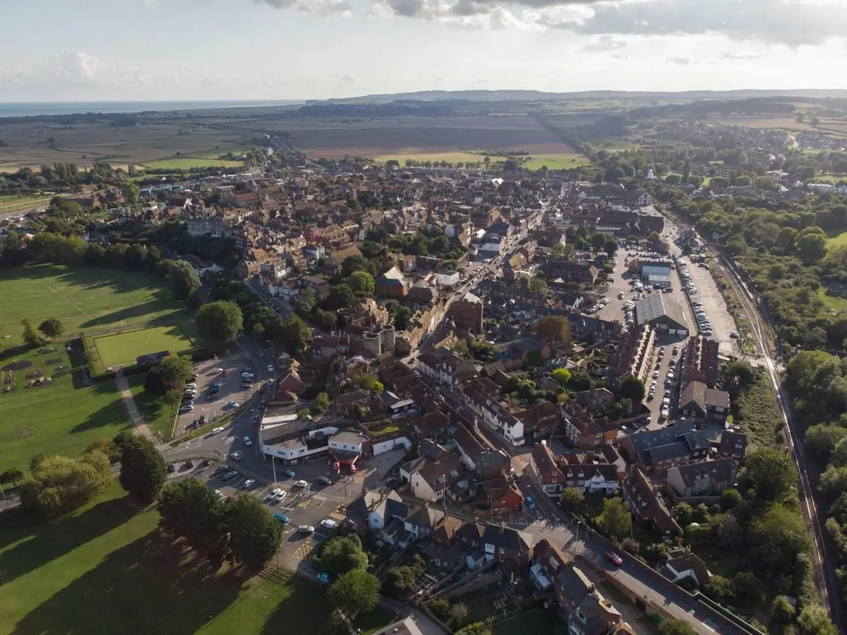 A stunning aerial view of a picturesque European town on a sunny day.
