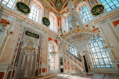 Explore the intricate designs and chandeliers within the grand Ortaköy Mosque in Istanbul, showcasing stunning architecture.