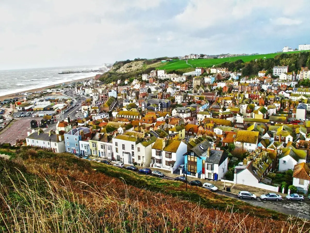 Charming coastal town with colorful houses and sea view from a high vantage point.