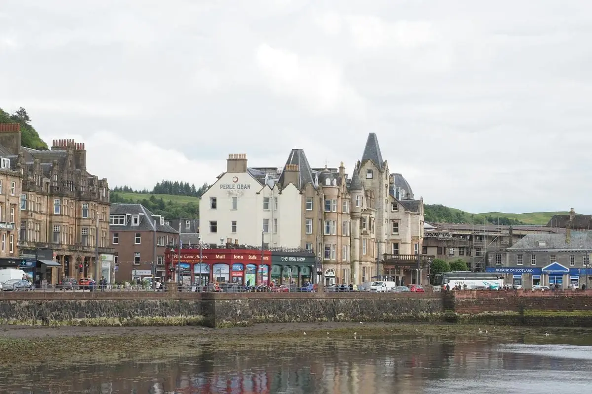 Charming Victorian architecture by the waterfront in Oban, Scotland, reflecting the town's historical charm.