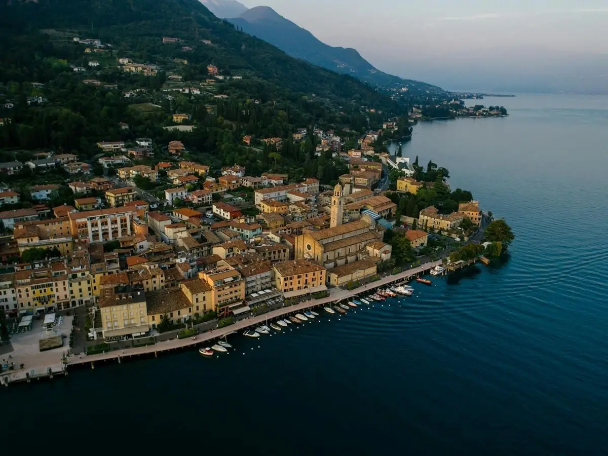 A breathtaking aerial shot of Salo along Lake Garda, showcasing the picturesque town and waterfront.