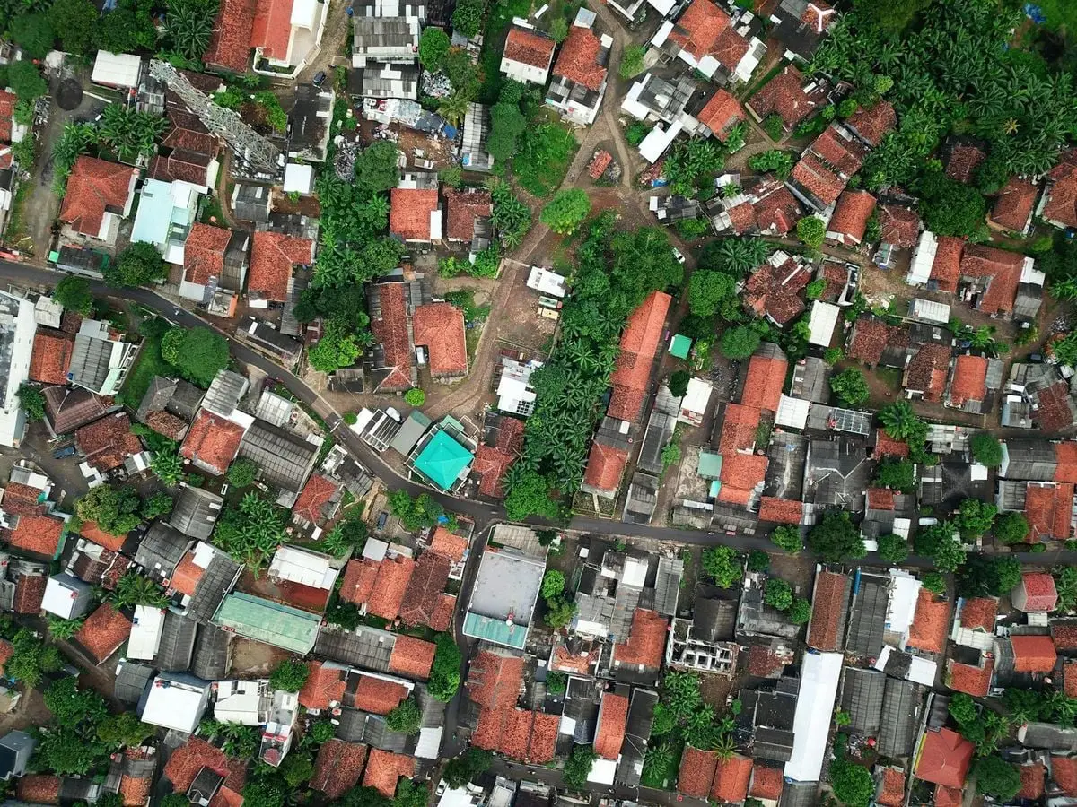 Aerial view of homes and greenery in Serpong, Indonesia, showcasing urban architecture.