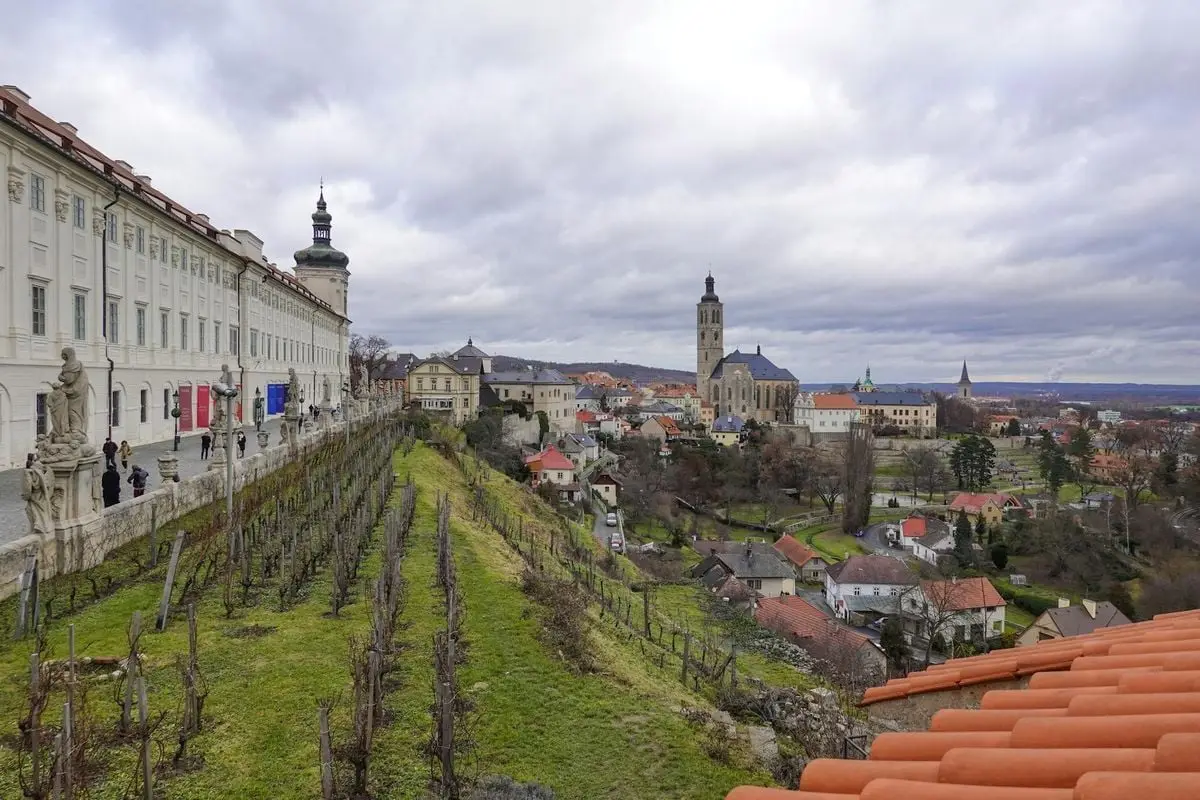 Explore the historic architecture and charming landscape of Kutna Hora, Czech Republic, captured on a cloudy day.