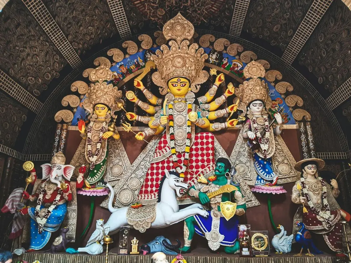 Colorful depiction of Hindu goddess Durga with entourage during Durga Puja festival in Kolkata.