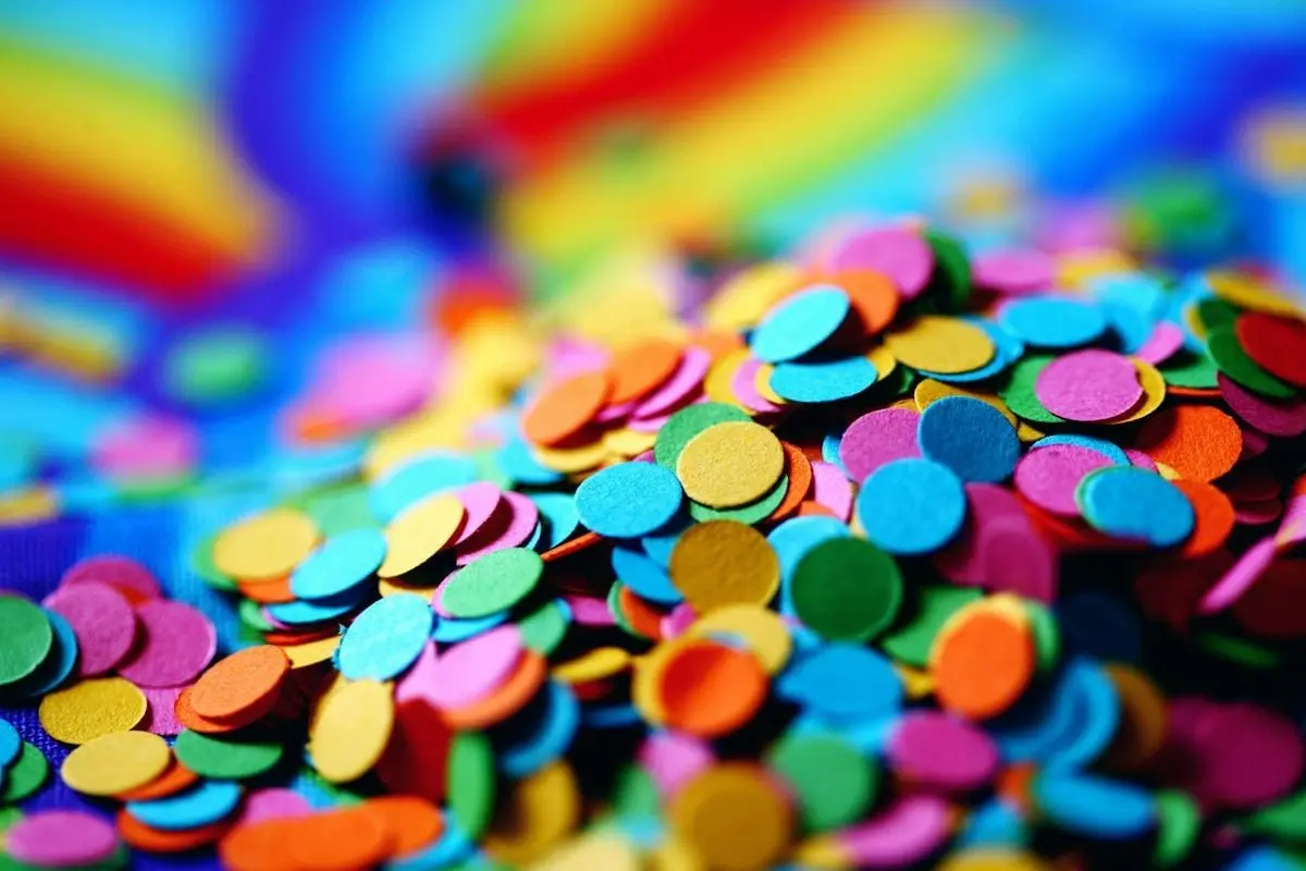 A vibrant mix of colorful confetti perfect for any festive occasion, showcasing joy and celebration.