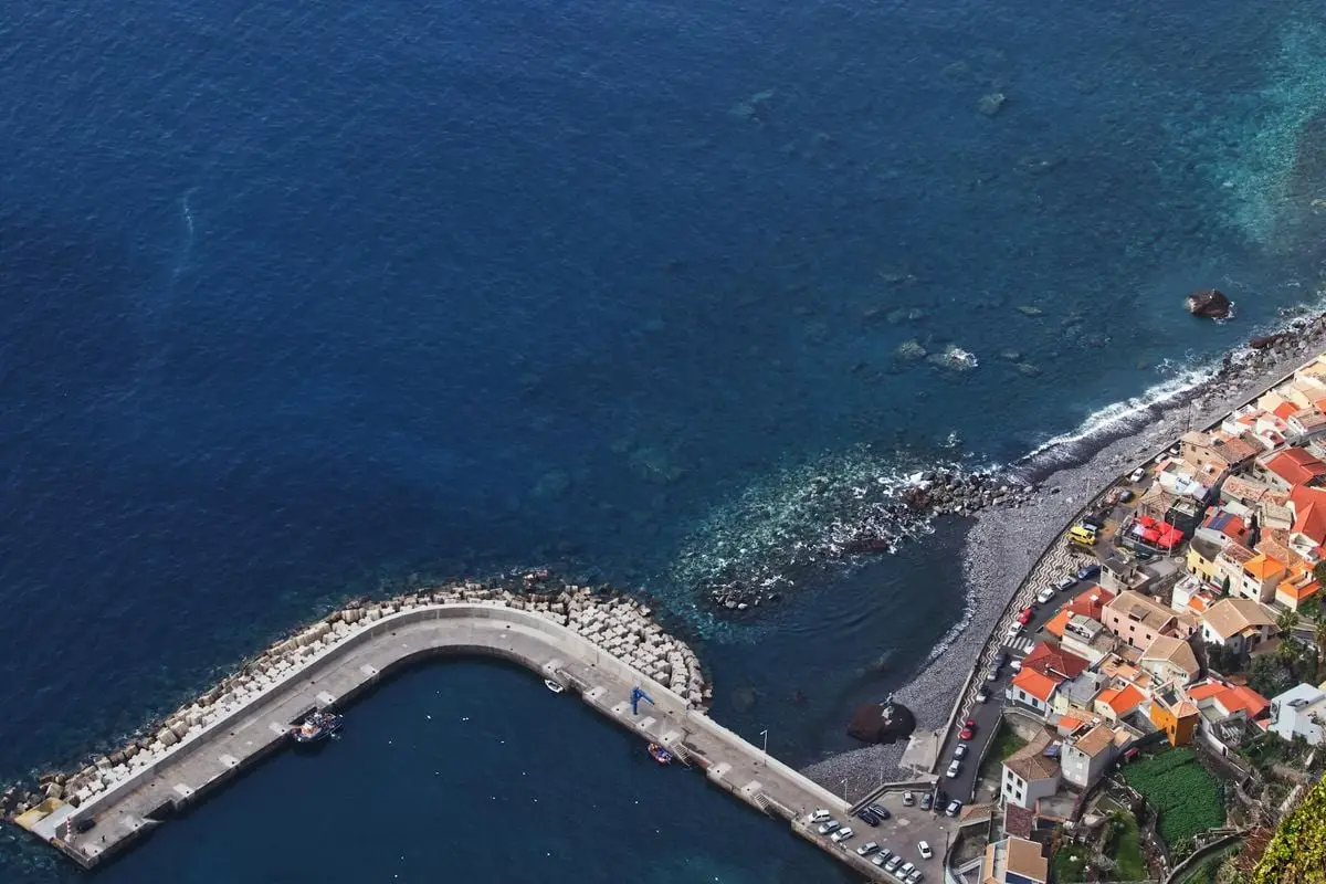 A stunning aerial shot of Funchal’s harbor and coastline in Madeira, Portugal.