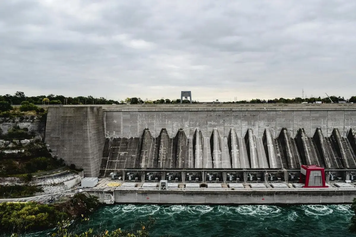 Aerial view of hydroelectric power plant at Niagara Falls, showcasing renewable energy.