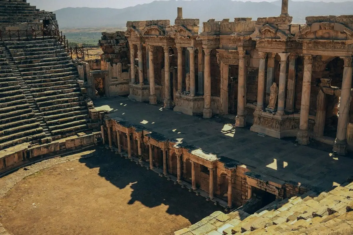 Ruins of the ancient Roman theater in Hierapolis, Turkey captured in daylight.