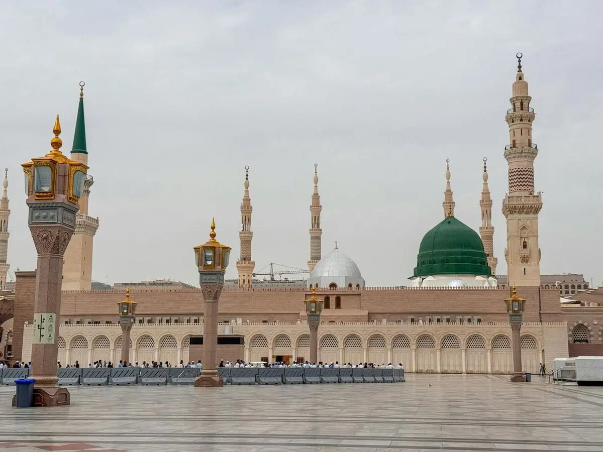 Stunning view of Al-Masjid an-Nabawi's iconic domes and minarets in Medina.