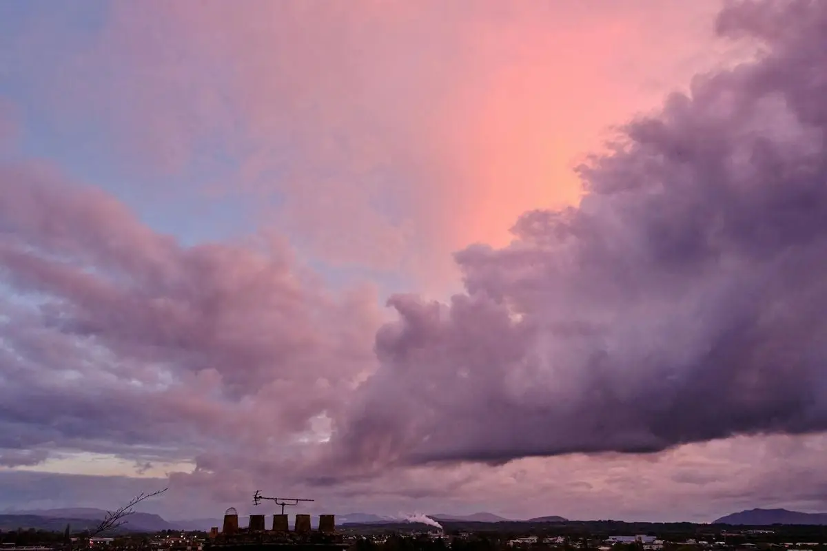 Captivating sunset sky with dramatic clouds over Penrith, England, offering a stunning natural view.
