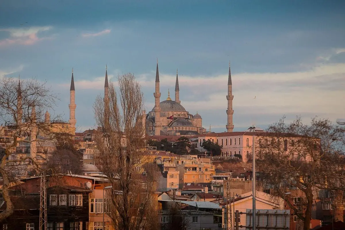 Captivating view of the Blue Mosque in Istanbul at sunset, highlighting its distinctive architecture.