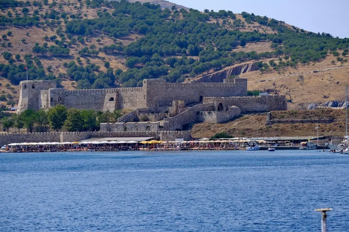 Majestic view of Bozcaada Castle with the Aegean Sea in the foreground. Perfect for history and travel enthusiasts.