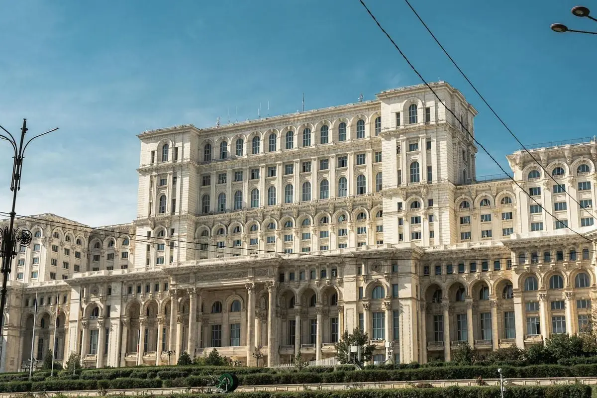 Capture of the iconic Palace of the Parliament in Bucharest, Romania under clear skies.